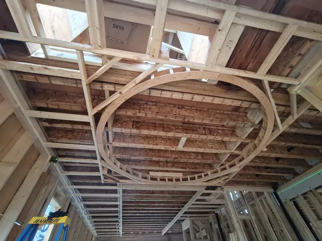 Round recessed ceiling feature framed into the floor joists