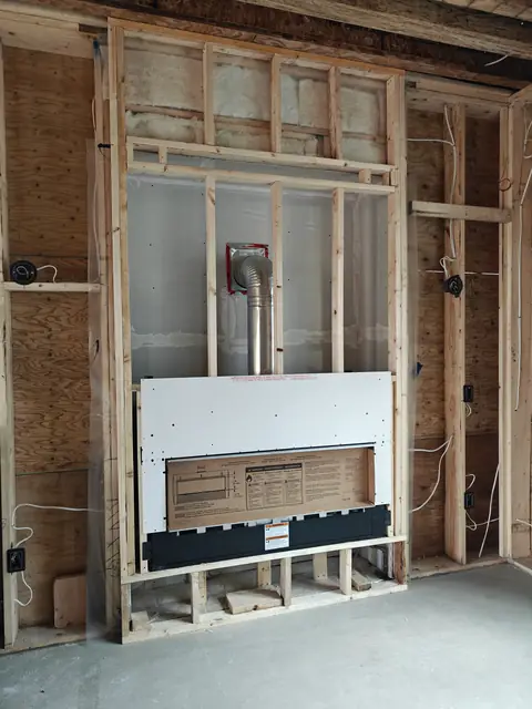 Fireplace wall and bulkhead framing with backing for finishes