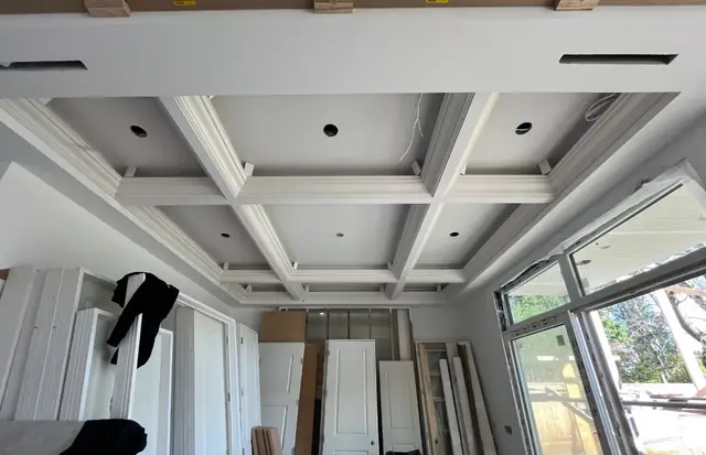 Coffered grid ceiling in a luxury residence under construction