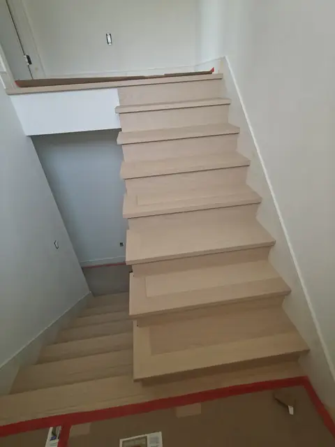 Light oak stair treads with a flush landing nosing